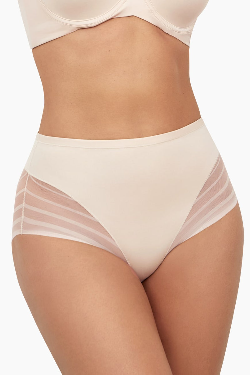 Curveez Control Briefs for Women Flawless in Light Blush offer moderate compression and tummy control with sheer striped mesh side panels for style.