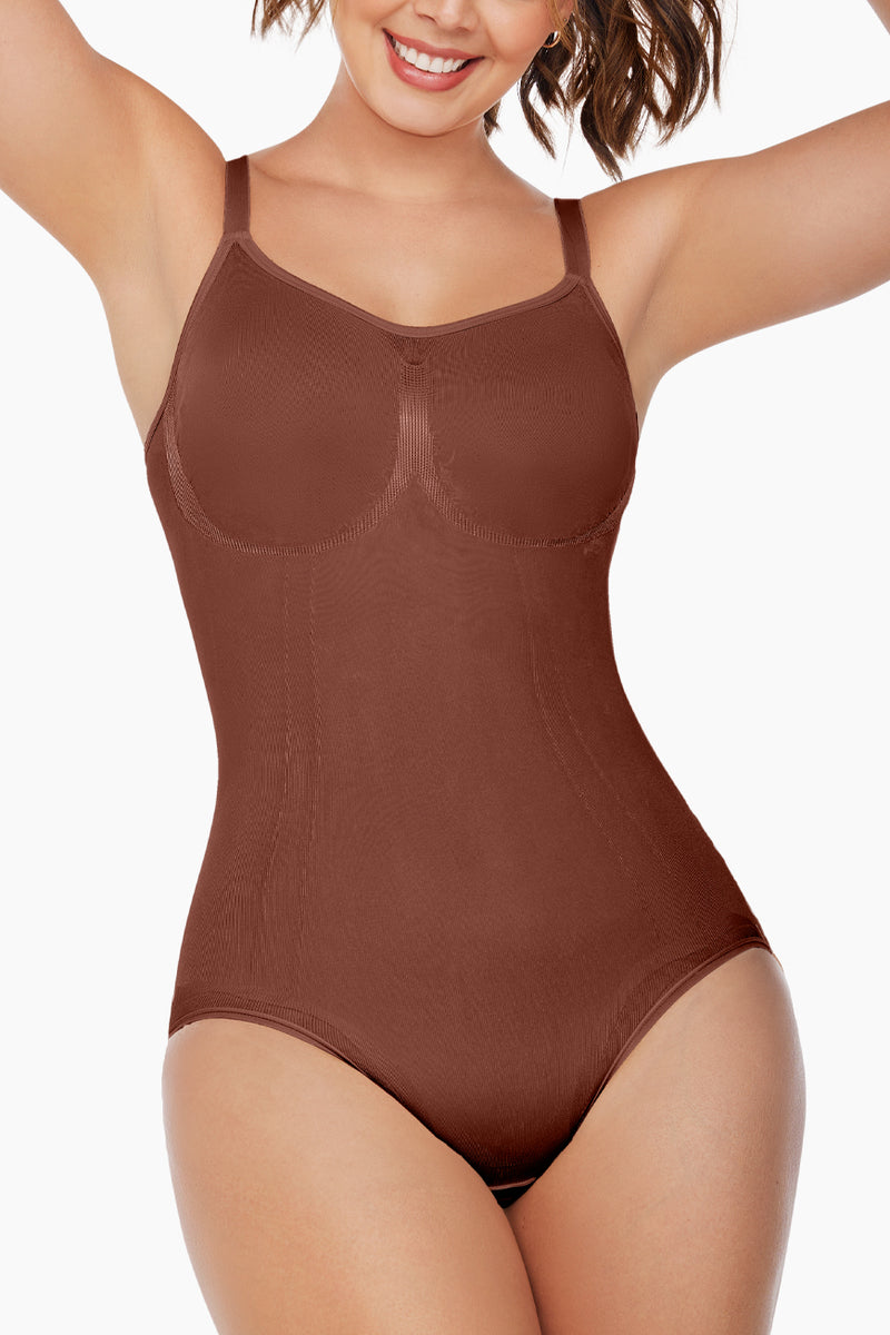 Comfort Evolution Bodysuit Thong in black with adjustable straps and seamless thong back, offering smooth shaping and curve-enhancing fit.