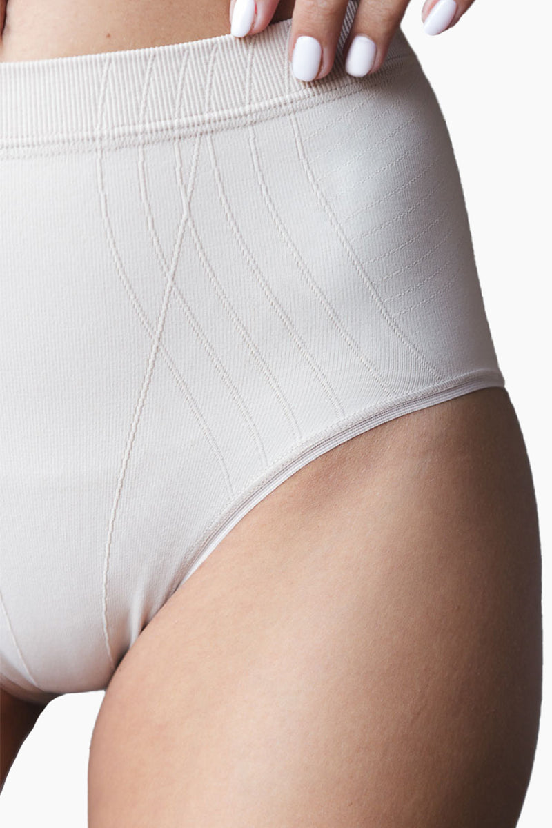 Close-up of white Contouring High-Leg Brief showing seamless stitching and contour lines for moderate compression and smooth fit.