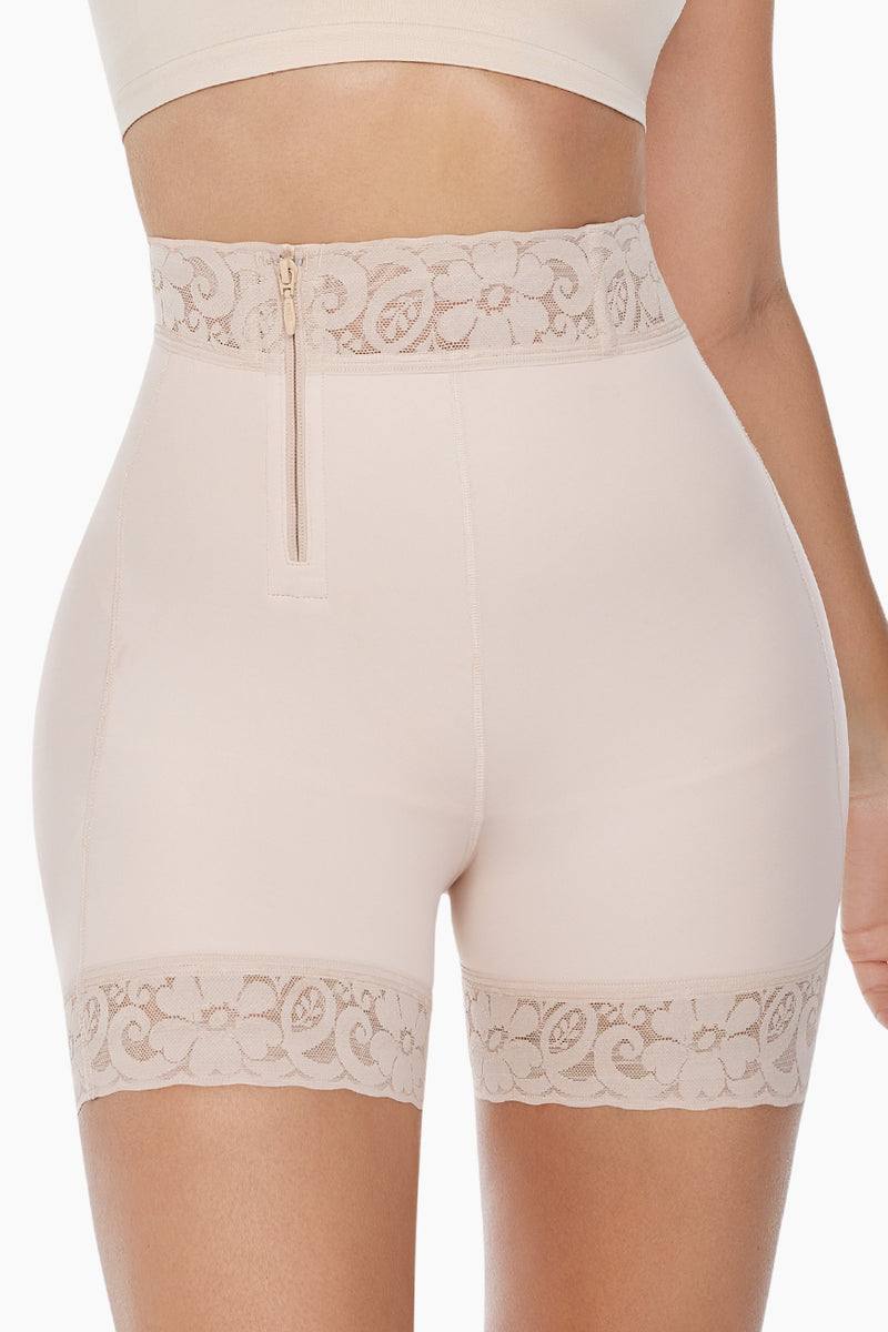 BBL Effect Easy Sculpt Hi-Cut Shorts in black with lace trim, featuring front zipper and high-waist design for shaping and support.