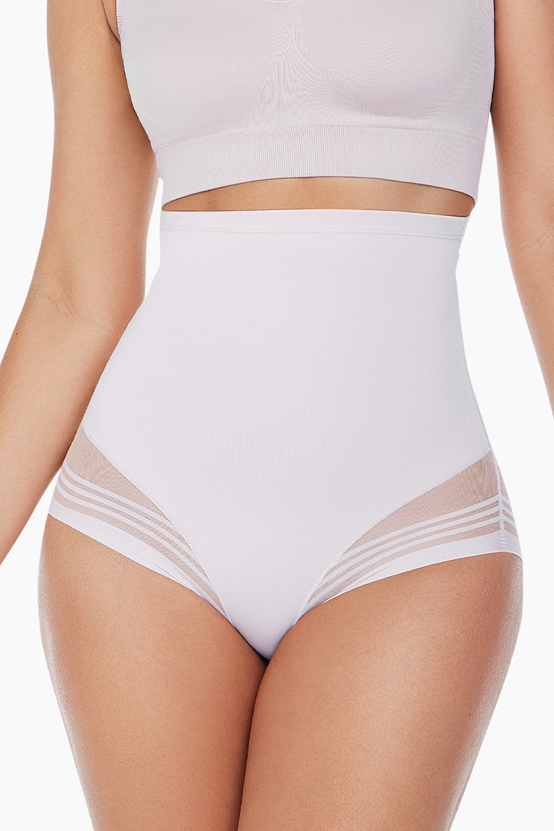 High Waist Women's Briefs Flawless in light blush by Curveez, featuring moderate compression and mesh paneling for tummy control and shaping.