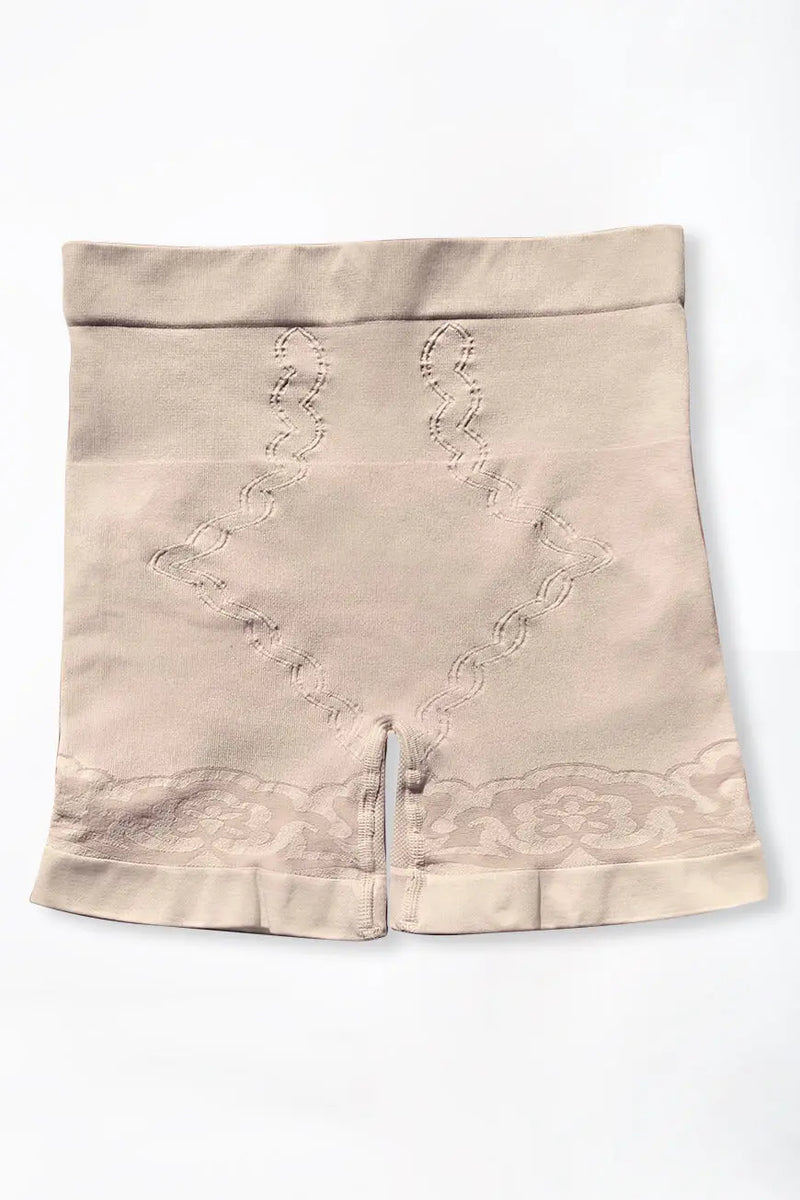 Flat lay of nude Curveez Boyshorts for Women displaying seamless design and compression zones for shaping support.